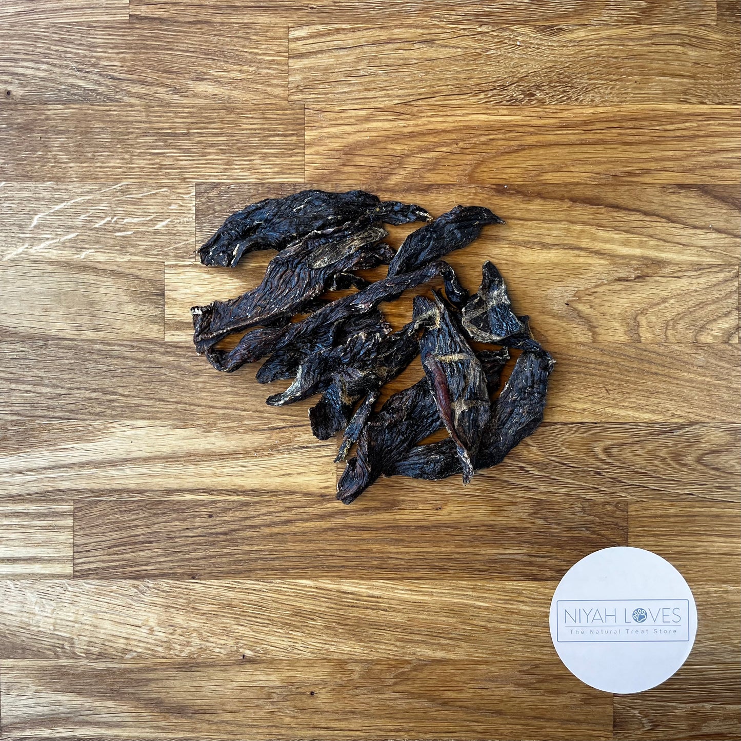 "Premium ostrich biltong dog treat – lean, hypoallergenic, air dried"