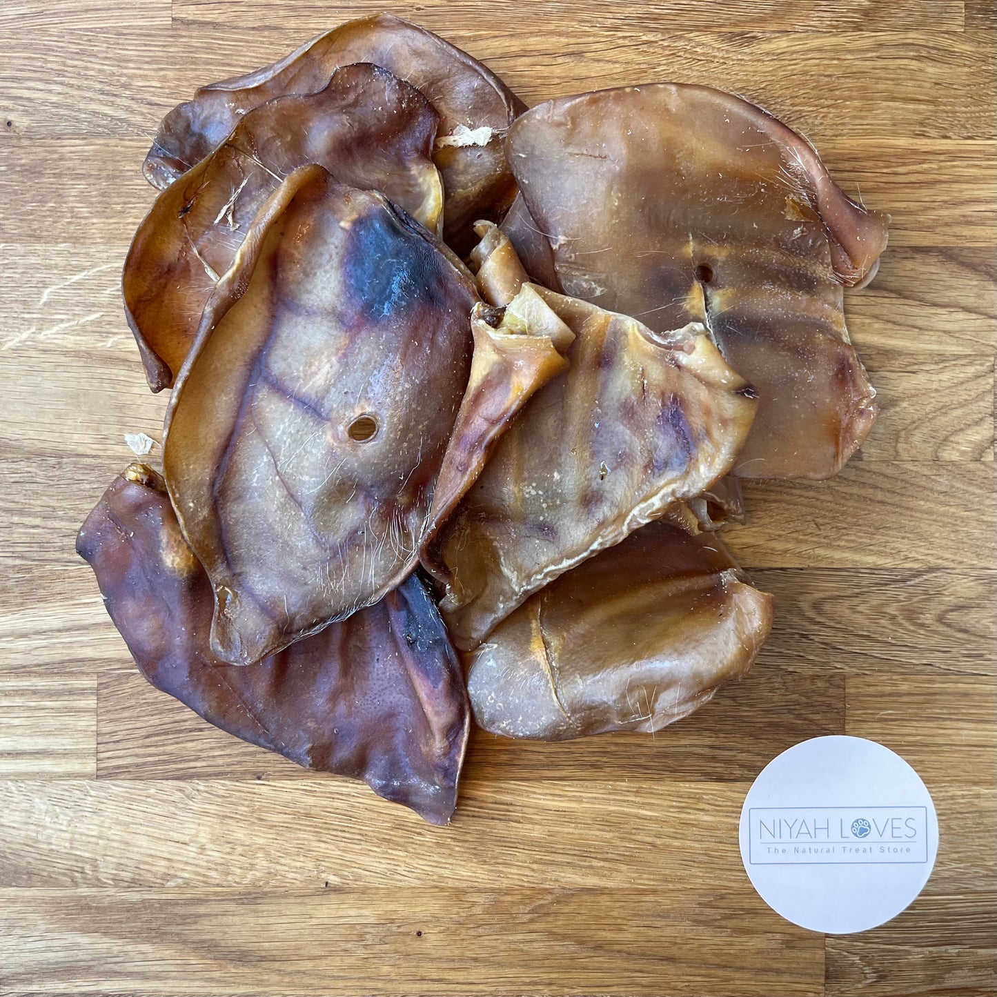 "Natural pig’s ears dog treat – low odour, gluten and grain free"