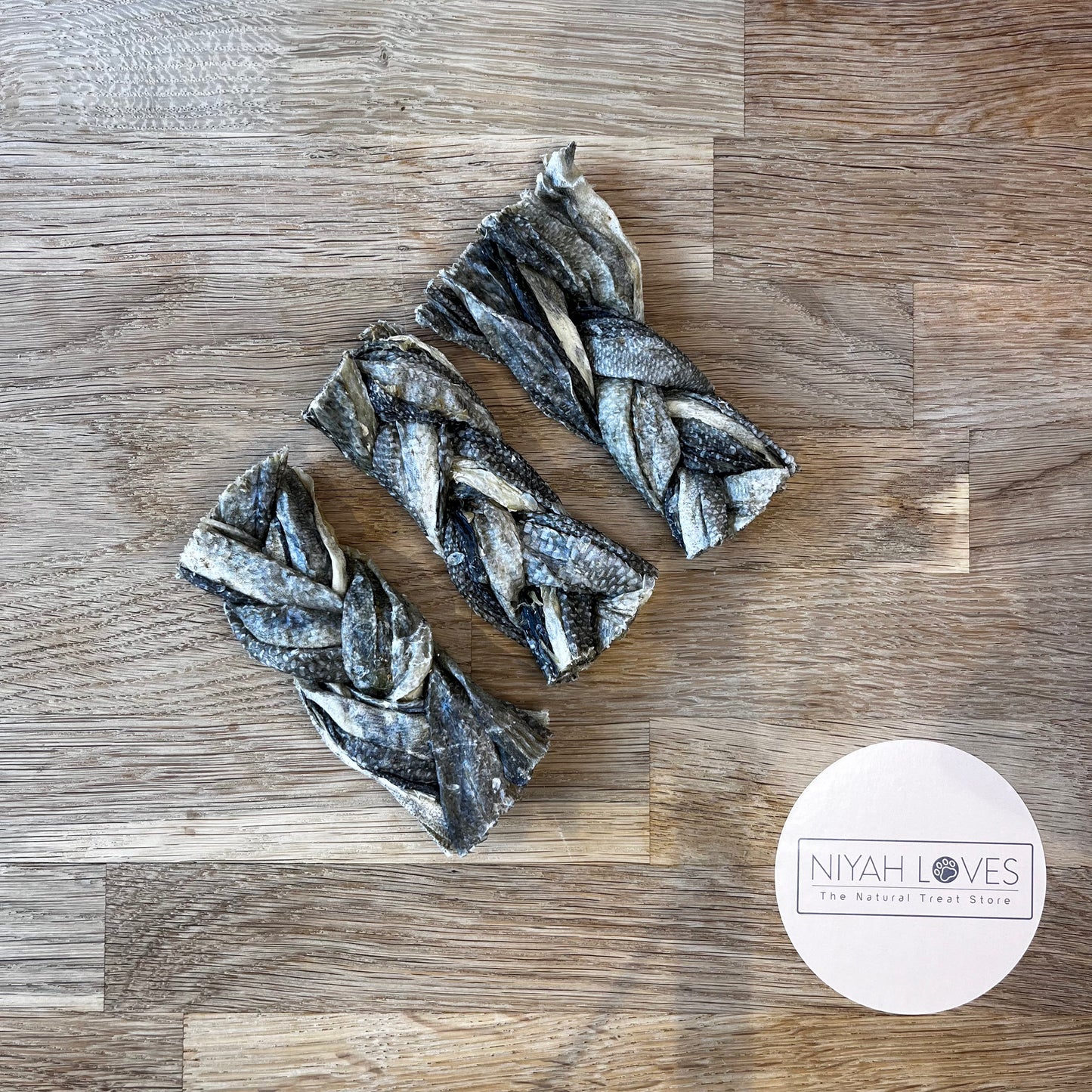 "Natural cod skin braid dog treat"